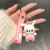 Lindo llavero de Sanrio con colgante de muñeco de dibujos animados para coche, accesorios para bolso, adornos colgantes, pequeño regalo al por mayor