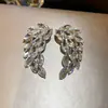 Pendientes colgantes de rombos con borlas tachonados de diamantes de aguja de plata transfronterizos europeos y americanos, pendientes exquisitos y de moda, pendientes versátiles y elegantes al por mayor