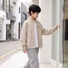 Chaqueta para Niños 2026 Otoño Nueva Chaqueta Infantil Ropa Infantil de Qingdao Estudiante de Secundaria Casual Manga Larga Cuello Alto Chaqueta Moderna