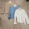 Outono de 2026 novo versátil simples moda solta alta qualidade camisa nicho designer camisa azul para mulheres