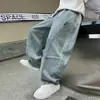 Pantalones para niños al por mayor jeans de color liso para niños 2025 nuevos pantalones de pierna ancha de moda para niños grandes pantalones comodín al por mayor