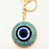 Venta caliente directa de fábrica moda caliente accesorios para ojeras azules al por mayor Amazon llavero ojo de diablo colgante