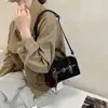 Bolso Boston retro de ante para mujer, nuevo estilo 2026, versátil, de alta gama, bolso nicho tipo almohada, bolso de hombro, bolso cruzado y bolso de mano