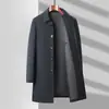 Gabardina transfronteriza para hombre 2026 otoño e invierno de longitud media estilo ejecutivo con cuello de solapa y tapeta oculta, adecuada para negocios casuales y ropa oficial de mediana edad