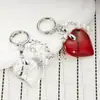 Ins Coreano Dulce Chica Cadena de Corazón Plateado con Lazo Colgante para AirPods Llavero de Chica Decoración Colgante para Bolso