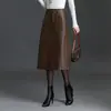 Elegante falda midi de color liso, minimalista, con abertura en el bajo para mujer, nueva colección otoño 2026, de talle alto, estiliza, corte A, moderna