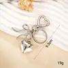 Ins Nuevo Acrílico Lazo Llavero Colgante Distintivo Diy Bolsa Bolsa Colgante Cadena Colgante para Audífonos Joyería