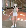 Tiro Real # Cuello Semi Alto, Ceñido a la Cintura, Corte Ajustado, Camiseta sin Mangas Adelgazante para Mujer, Verano 2026, Lyocell Tencel.