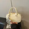 Bolsa de Boliche Portátil para Mulheres 2026 Verão Nova Tendência Estilosa Bolsa Almofada de Alto Valor Bolsa de Ombro Transversal