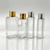Botellas cuadradas pequeñas transparentes de 30/50 ml con tapas doradas y plateadas para dispensar aceites esenciales, champú y gel de ducha