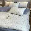 Exportar a Corea: Juego de ropa de cama jacquard de cuatro piezas estilo coreano con bolso, juego de ropa de cama de cuatro piezas al por mayor