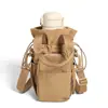 Bolsa de Ombro para Garrafa de Água Esportiva Leve Tendência ao Ar Livre para Mulheres 2026 Novo Modelo Bolsa de Mão com Múltiplos Bolsos Bolsa Transversal Versátil para Celular