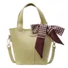 Bolso Pequeño Texturizado de Alta Gama para Mujer 2025 Estilo Nuevo de Moda Bolso Cruzado Versátil Bolso de Mano Moderno Simple Bolso Cubo