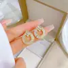[Acero de Titanio] Anillo Collar Aretes Set Trébol de la Suerte Lujo Ligero Micro-incrustado Personalidad Elegante Banquete Combinación Collar de Oreja