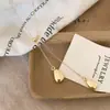 Collar Minimalista Francés con Colgante de Gota de Agua para Mujer 2025 Nuevo Diseño de Nicho Cadena Larga para Suéter Accesorio Versátil