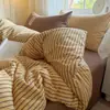 Novo Conjunto de Roupa de Cama Macio e Fofo de Algodão de Quatro Peças 2026, Conjunto de Roupa de Cama Artístico Fresco e Fofo para Estudantes de Três Peças