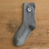 Calcetines largos de algodón peinado para mujer, otoño e invierno, bordados de corazón, dulces, versátiles, casuales, estilo universitario, hasta la pantorrilla