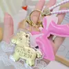 Ano do Cavalo Ouro Puro 999 Chaveiro Riqueza Instantânea Cavalo Dourado Rosa Grande Laço Pingente Pequeno Presente Atacado
