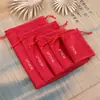 Bolsa de franela con cordón para guardar joyas, estuche para auriculares móviles, suministro directo de fábrica.