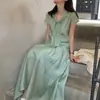 Conjunto de dos piezas para mujer de estilo coreano minimalista, top de manga corta con cinta y falda larga adelgazante, súper popular y extremadamente elegante