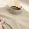 Venta al por mayor Comercio exterior Camiseta de manga larga de color liso para hombres de mediana edad Otoño e Invierno Top versátil de cuello alto medio Capa base térmica