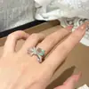 Conjunto de quatro peças elegante de anel, colar, brincos e pulseira com zircônia, requintado e versátil, estilo borboleta coreano, design requintado de Dongdaemun