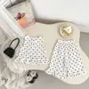 Conjunto sin mangas de lunares para niña 2026 Nuevo Conjunto de dos piezas de chaleco con volantes fino y transpirable y pantalones cortos para bebés