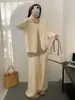 Conjunto de primavera extremadamente elegante, un conjunto de dos piezas de talla grande con un toque de alta gama, que consta de un top de punto tipo dos piezas y pantalones de pierna ancha.