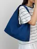 Bolsa de lona de gran capacidad para mujer, nuevo modelo 2026, estilo casual relajado de primavera y otoño, bolso de hombro individual, bolsa de mano para la escuela