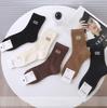 Nuevos Calcetines de Miu Estilo para Mujer Primavera y Otoño, de Media Pantorrilla, Doble Puño, Color Sólido, Calcetines Deportivos Simples, Productos Europeos de Nicho