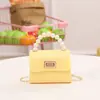Bolsa 2023 nueva fina suave mini patrón de cocodrilo asa de cierre bolsa de gelatina pequeña fresca bolsa para lápiz labial transmisión en vivo