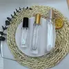 Botella de Vidrio Transparente Vacía con Atomizador de Presión Cuadrado de 10 ml, Botella de Empaque para Perfume y Aceite Esencial, Botella Dosificadora Cosmética Transparente