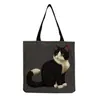 Directo de fábrica estilo coreano bolso de hombro práctico de dibujos animados moda versátil bolsa de mano lindo gato estampado bolsa de compras