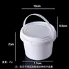 Venta al por mayor del fabricante Barril de plástico blanco Barril redondo Almacenamiento de frutas Barril sellado 1-5L Grado alimenticio Bolsa de mano Barril de plástico transparente