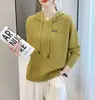 Moletom com Capuz para Mulheres 2026 Novo Outono Estilo Coreano Suéter Curto Solto Feminino Primavera e Outono Cor Pura Blusa de Tricô