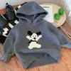 Roupas infantis coreanas: Coleção Outono/Inverno 2026, moletom com capuz estiloso e moderno com um design fofo de cachorro de desenho animado para meninos