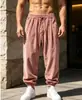 Pantalones jogger de pana para hombre europeos y americanos, pantalones tipo harén holgados con cordón para otoño e invierno, pantalones casuales retro de caída ancha para hombre