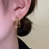 Pendientes únicos de doble fila en forma de C dorados, nuevo estilo de adelgazamiento de alta gama, pendientes de alta gama para mujer, pendientes populares de aguja de plata de verano