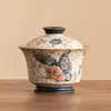Tazón Cubierto Azul y Blanco Flintstone Rojo Dorado Pintado del Fabricante Tazón de Té Jin'An con Tapa Flor de Amor Mariposa Juego de Té de Cerámica Taza de Té de Gran Capacidad