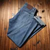 Estación europea primavera y verano fino lyocell tencel transpirable hielo oxígeno fibra fresca lavado elástico recto ajustado jeans