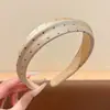 Diadema de lunares estilo coreano de ala ancha para mujer, de alta gama, elegante, moderna, accesorio para el cabello de moda para uso diario, diadema de corona alta