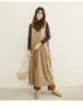Vestido sin mangas de estilo japonés para otoño e invierno, corte holgado, con bolsillos, color liso, versátil y elegante, cuello en V, vestido largo para usar en capas
