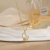 Colar para Mulheres, Flor de Zircônia Bauhinia Giratória da Moda Nicho Moda Novo Design Pingente Titânio Aço Colar de Temperamento