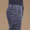 Calças de trabalho masculinas transfronteiriças, corte slim, calças masculinas versáteis, novas calças compridas casuais resistentes ao desgaste para outono e inverno, retas e largas para homens