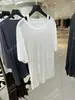 DestacadoYuran 26 Nueva Colección de Principios de Otoño: Camisa de Modal Texturizada de Manga Corta con un diseño en capas, tipo dos piezas