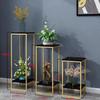 Estante de flores de hierro forjado de estilo nórdico, estante decorativo, estante para macetas carnosas laureadas verdes, estante para flores de almacenamiento multicapa para sala de estar en interiores.
