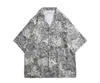 Camisa de manga corta estilo Hong Kong para hombres y mujeres parejas verano holgada fina hawaiana playa floral manga de cinco puntos camisa floral