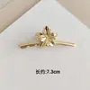 Pinza Metálica para Cabello con Flor Hueca Transfronteriza Europea y Americana Pinza de Tiburón Simple para Moño en la Parte Posterior de la Cabeza Pinza de Cabello Elegante Versátil Accesorio para el Cabello