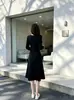 Vestido casual negro para mujer, nueva colección otoño 2026, con un diseño de inspiración francesa y una silueta A única y elegante