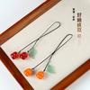 Colgante doble de caqui bueno esmalte de color Llavero de caqui jade Dongling cadena para teléfono móvil versátil caqui caqui adornos Ruyi al por mayor